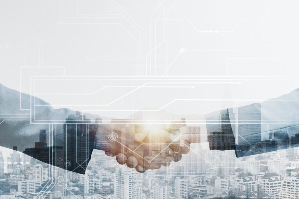 Business partners handshake global corporate with technology con